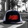 Headbanger Sports I8501 Cap America Flexfit Performance Trucker Mesh Back Hat: Black / White / Sunset 1 Headbanger Sports I8501 Cap America Flexfit Performance Trucker Mesh Back Hat: Black / White / Sunset -Passion Baseball Sundset1